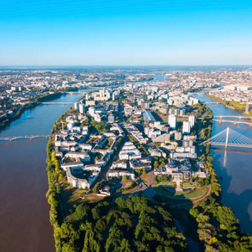 Nantes city between the branches of the Loire river aerial view in Loire-Atlantique region in France